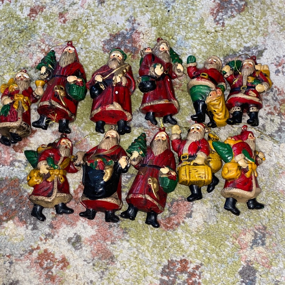 Vintage 1980s plastic Santa ornaments.